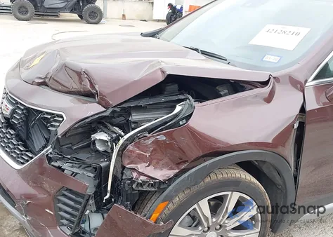 2022 Cadillac Xt4 Fwd Premium Luxury from USA, damaged, VIN 1GYFZCR4XNF116845